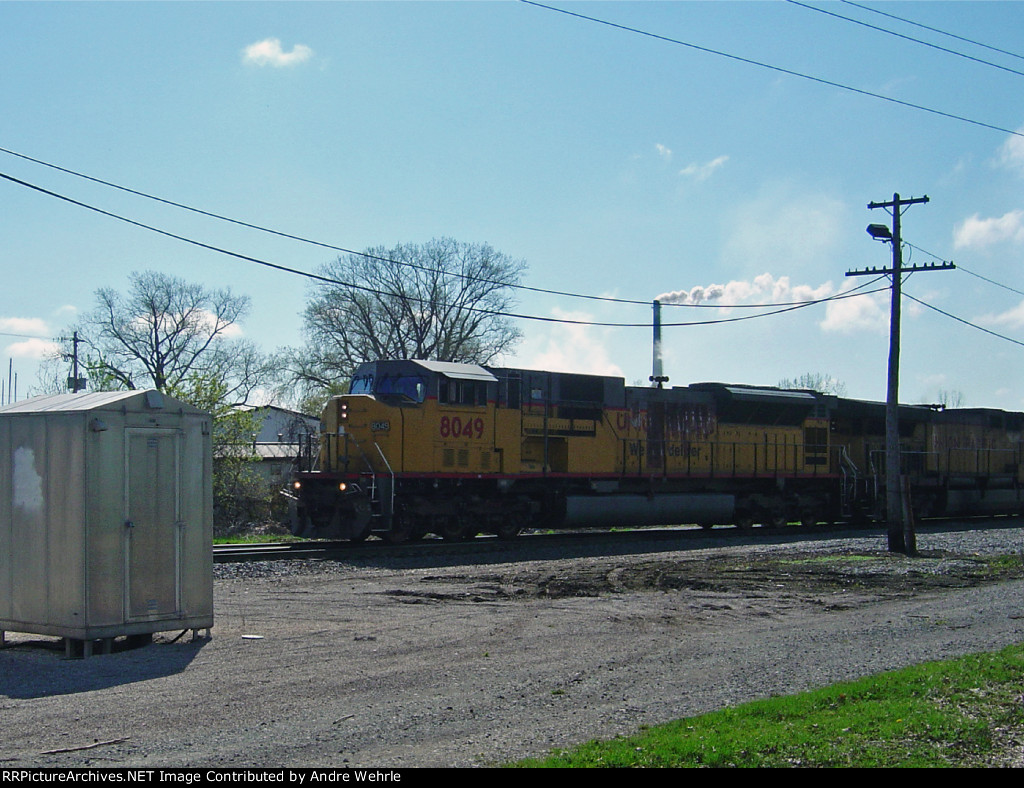 UP 8049 leads 7037 into the yard entrance